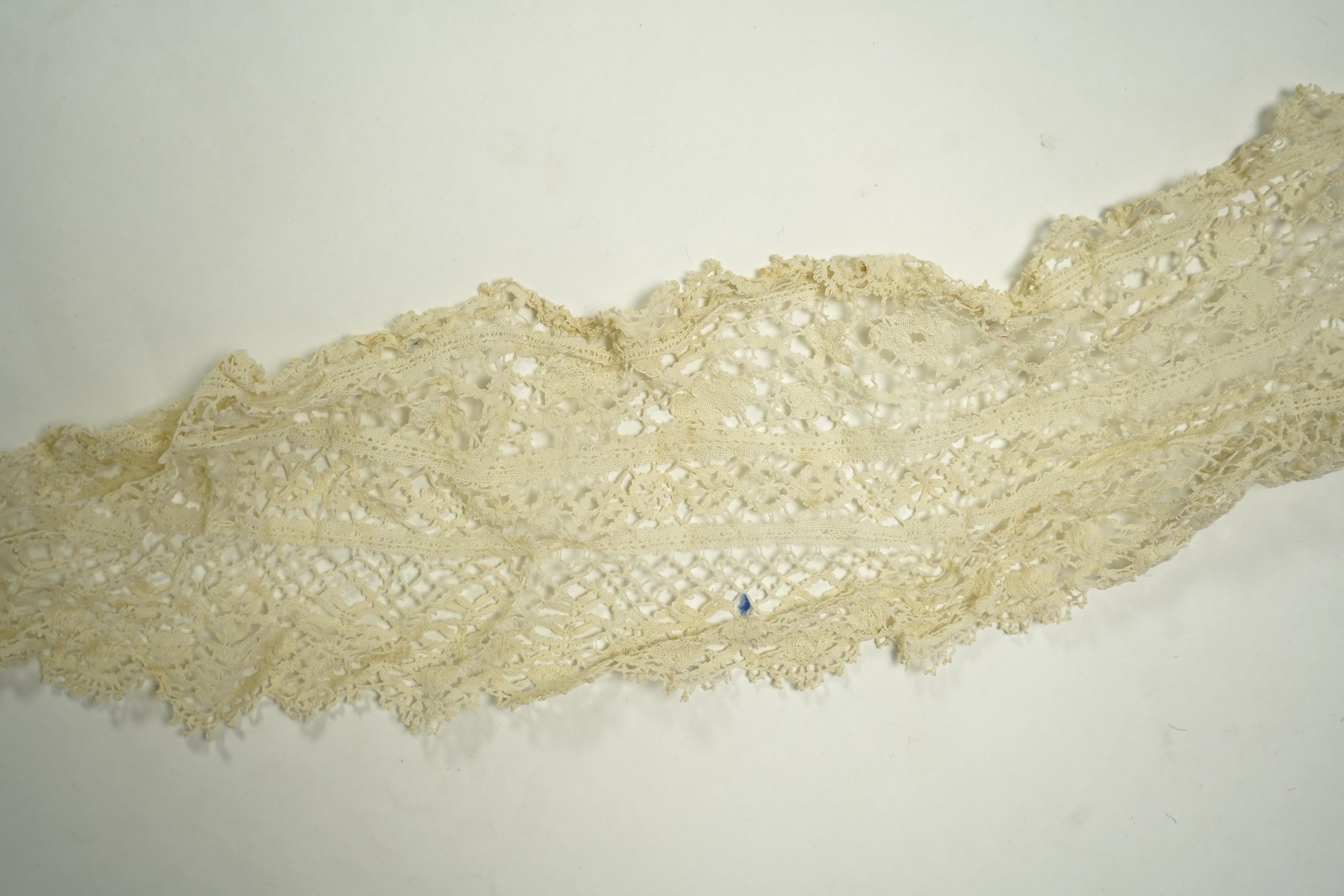 A mixed Brussels bobbin lace and Point de Gaze lace collar, another smaller collar, a similar length of trim and butterfly motif, together with a Brussels bobbin collar and trim, an Irish crochet cuffs, a Valenciennes la